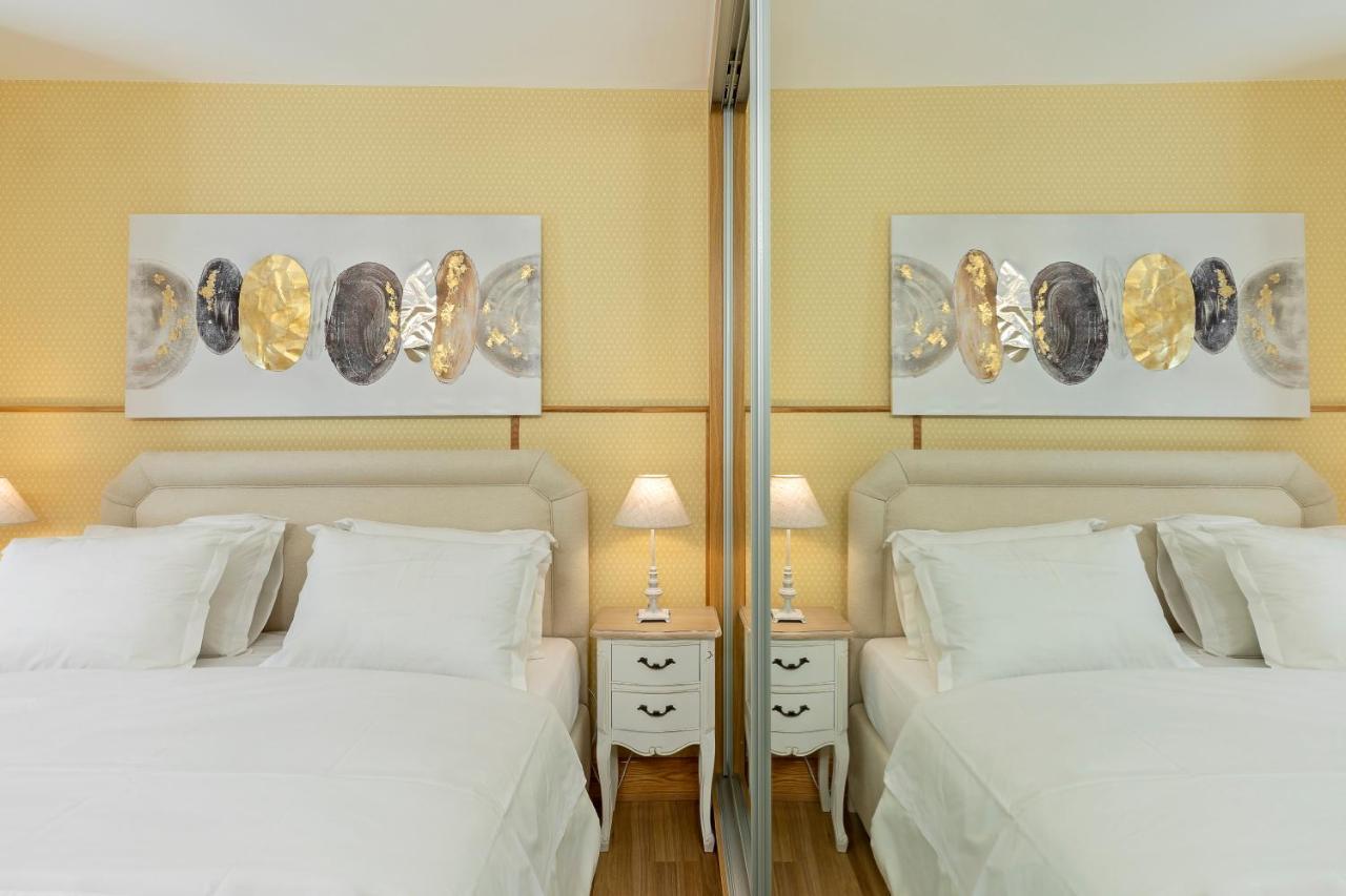 Vouliagmeni'S Elegance By Acropolis Suites Atenas Exterior foto